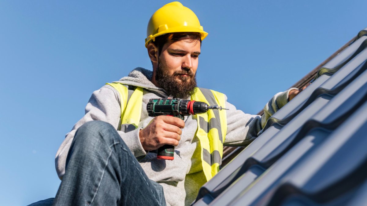 man-working-roof-front-view